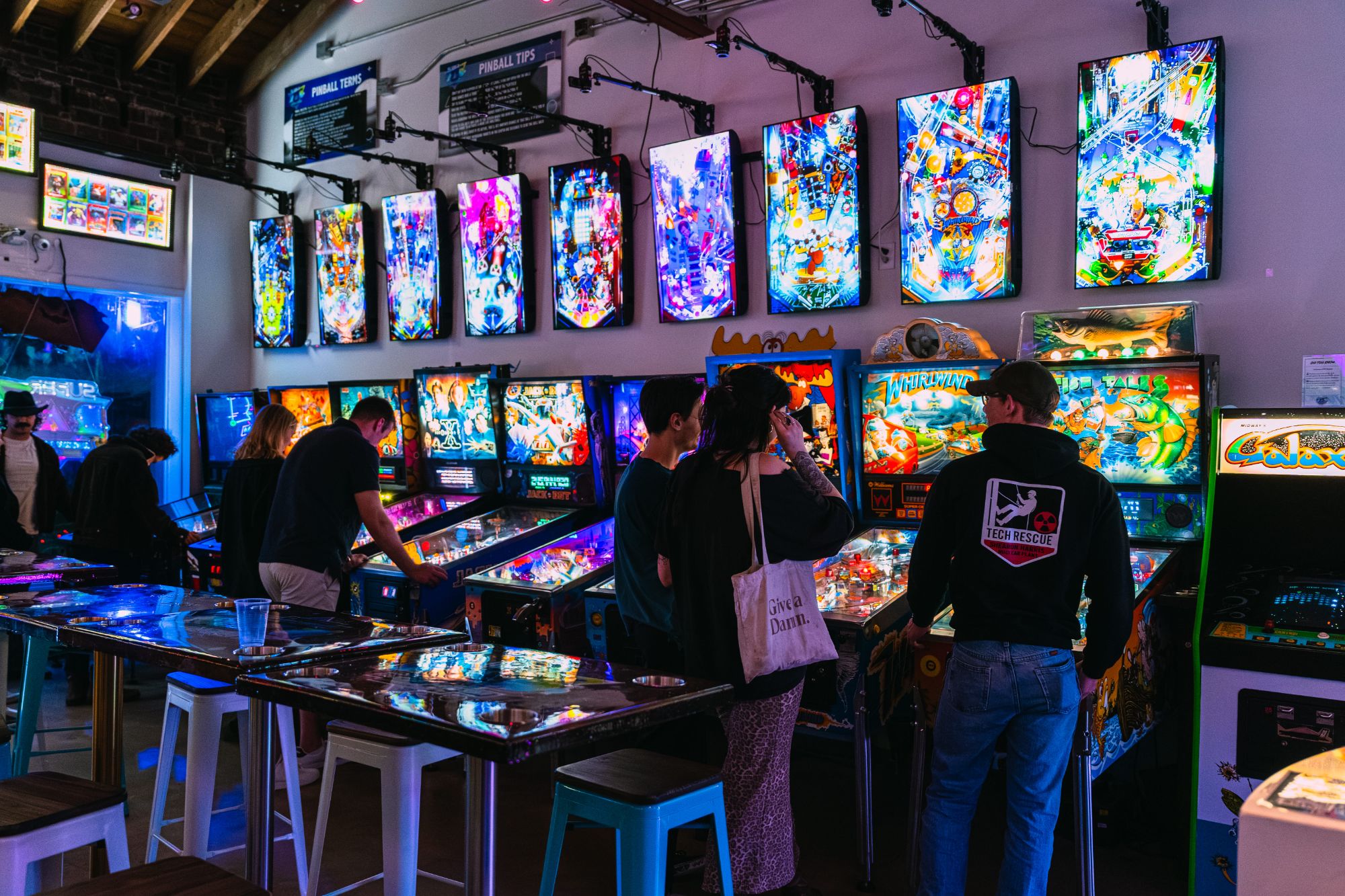 Pinball machines lined up at Super Rad Retro Lounge Raleigh